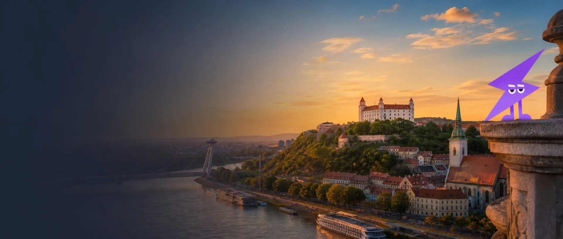 Bratislavský hrad nad Dunajom pri západe slnka s maskotom Wattiva.